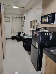 Η κουζίνα ή μικρή κουζίνα στο 2BR Mountain View Condo SMDC Charm Metro Manila