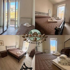 Ένα ή περισσότερα κρεβάτια σε δωμάτιο στο La Nocciola apartment