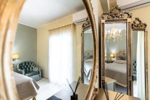 Vuode tai vuoteita majoituspaikassa Mythodea Luxury Villa