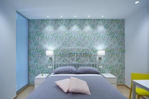 Ένα ή περισσότερα κρεβάτια σε δωμάτιο στο SalDimora +15 φωτογραφίες