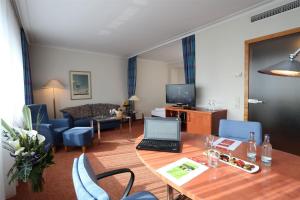 TV a/nebo společenská místnost v ubytování Dolce by Wyndham Bad Nauheim