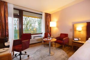 Posezení v ubytování Dolce by Wyndham Bad Nauheim