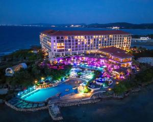 an aerial view of the resort at night at Hyatt Regency Seragaki Island Okinawa in Onna