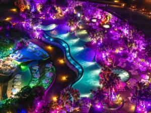 an aerial view of the magic kingdom at night at Hyatt Regency Seragaki Island Okinawa in Onna +37 photos