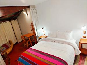 Voodi või voodid majutusasutuse Luquina Experience Lodge toas