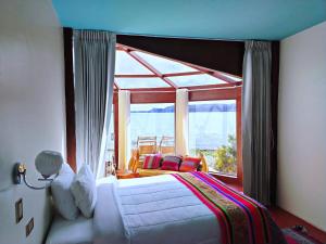 Voodi või voodid majutusasutuse Luquina Experience Lodge toas