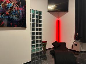 TV a/nebo společenská místnost v ubytování Qt suite & luxury