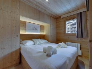 Posteľ alebo postele v izbe v ubytovaní Appartement rénové au cœur de Val d'Isère - 1 chambre + coin montagne, balcon sud, parking inclus - FR-1-567-95