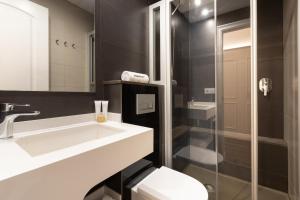 Koupelna v ubytování Enjoybcn Coliseum Apartments
