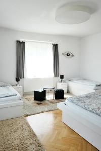 Posteľ alebo postele v izbe v ubytovaní Vilas & Wellness Resort Orlík