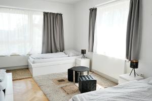 Posteľ alebo postele v izbe v ubytovaní Vilas & Wellness Resort Orlík
