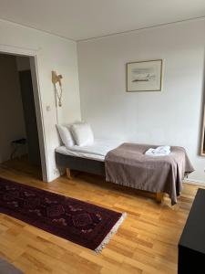 Letto o letti in una camera di Värdshuset Hwitan