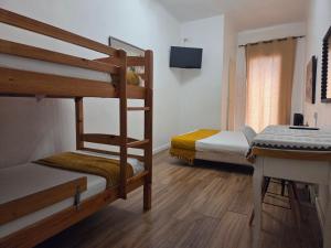 Postel nebo postele na pokoji v ubytování Hotel Le Centre