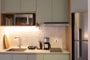 Dapur atau dapur kecil di Studio Moderno ao Lado do Shopping Palladium +9 gambar