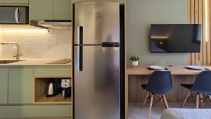 Dapur atau dapur kecil di Studio Moderno ao Lado do Shopping Palladium