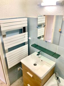 Koupelna v ubytování Studio cosy au cœur de la station des Carroz