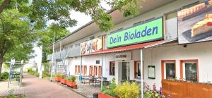a building with a sign on the side of it at Hotel Spilburg in Wetzlar