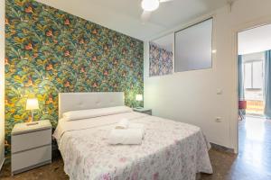 Posteľ alebo postele v izbe v ubytovaní CENTER SEVILLA MAGDALENA PREMIUM, FREE Parking