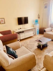 TV a/nebo společenská místnost v ubytování Nova suite