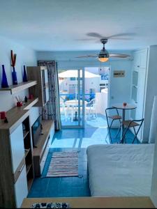 a living room with a couch and a table at Relaxation and Sun in Puerto del Carmen