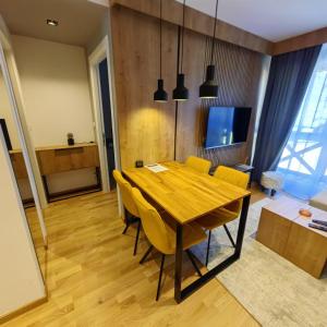 Televízia a/alebo spoločenská miestnosť v ubytovaní DivciCasa apartments Divčibare