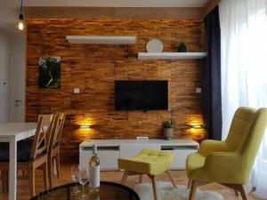 Televízia a/alebo spoločenská miestnosť v ubytovaní DivciCasa apartments Divčibare