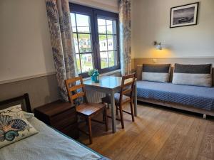 Postel nebo postele na pokoji v ubytování Pokoje Gościnne Rejs + 24 fotografií