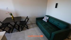 Χώρος καθιστικού στο Loft em Ponta Grossa com Excelente Localizacao