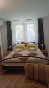Posteľ alebo postele v izbe v ubytovaní Apartments Olivia