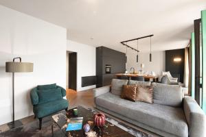 Khu vực ghế ngồi tại Palazzo Apartments - Porto Letizia
