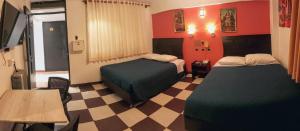 Letto o letti in una camera di Hotel Cusco Museo