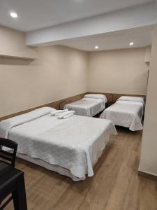 Postel nebo postele na pokoji v ubytování Montequinto apartamento 50m en Semisótano + 23 fotografií