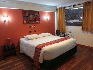 Letto o letti in una camera di Hotel Cusco Museo