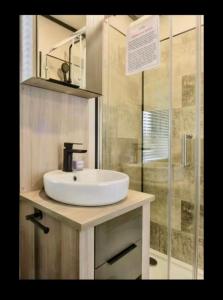 Koupelna v ubytování Sol + 9 fotografií