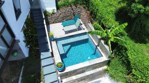 Bazén v ubytování Villa T4 avec piscine, 6 à 8 personnes nebo v jeho okolí