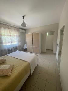 Postel nebo postele na pokoji v ubytování Le gîte du pré en Avignon