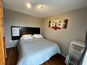 Postel nebo postele na pokoji v ubytování Yemanya Hostal