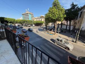 a view of a city street with cars on the road at HrD Luxury Rooms in Palermo