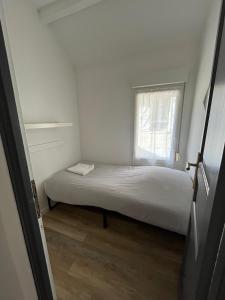 Postel nebo postele na pokoji v ubytování Vilnius - Confort familial + 1 fotografie