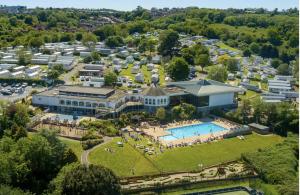 an aerial view of a resort with a pool at Edgewater Retreat- Pet Friendly-On Award winning Hoburne Devon bay in Goodrington