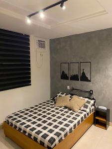 Studio com piscina no Casa Mauá客房内的一张或多张床位