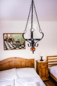 Postel nebo postele na pokoji v ubytování Mlýn Kozlovice