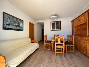 a living room with a couch and a table at Casablanca in Miramar