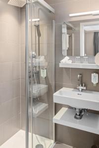 Phòng tắm tại Best Western Plus Hotel Zürcherhof