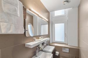 Phòng tắm tại Best Western Plus Hotel Zürcherhof