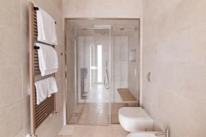 Koupelna v ubytování Suites Dimora Garibaldi + 37 fotografií
