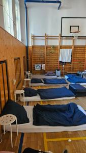 Postel nebo postele na pokoji v ubytování Hostel IN school