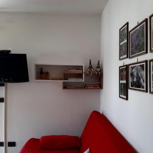 TV a/nebo společenská místnost v ubytování DOLOMITI DA VIVERE