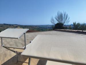 a tennis table on top of a tennis court at Casale San Martino Agriturismo Bio in SantʼAngelo in Pontano