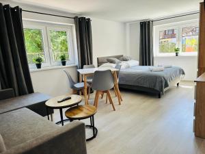 Ένα ή περισσότερα κρεβάτια σε δωμάτιο στο Anemos